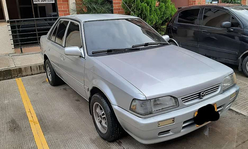 Mazda 323 2004(Negoc...