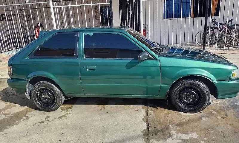 Hermoso Mazda 323...