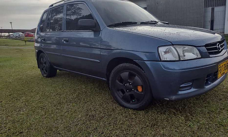 Hermosa Mazda Demio ...