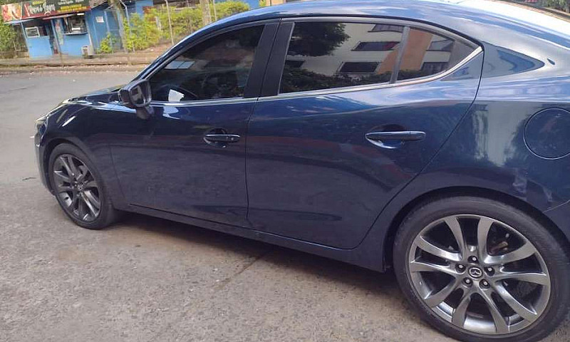 Mazda 3 Grand Tourin...