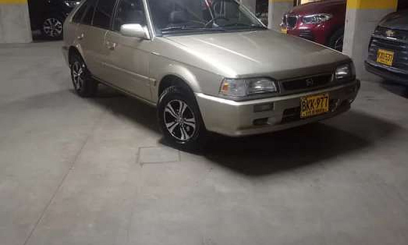 Vendo Mazda 323 Exel...
