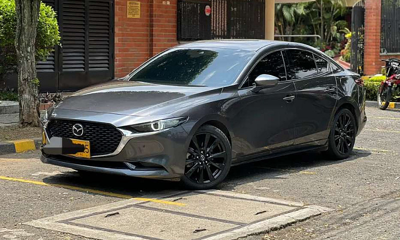 Mazda 3 Grand Tourin...