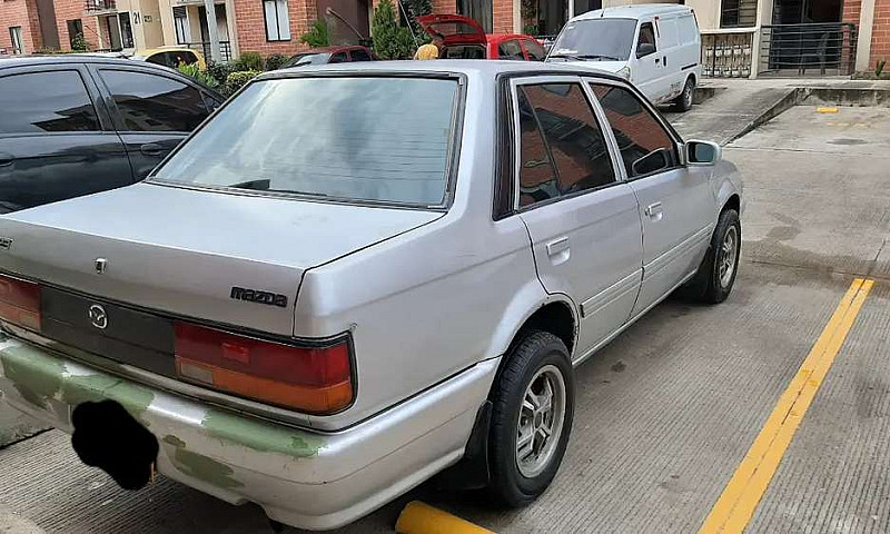 Mazda 323 2004(Negoc...