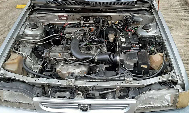 Mazda 323 2004(Negoc...