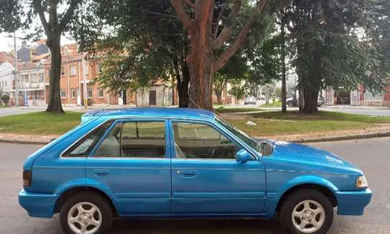 Vendo Mazda 323 Hs 1...