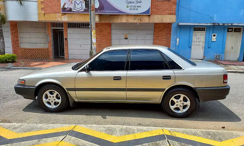 Vendo Impecable Mazd...