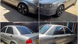 Hermoso Mazda Allegro Sedan 2004