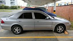 $23M Mazda Milenio 04 Caleño